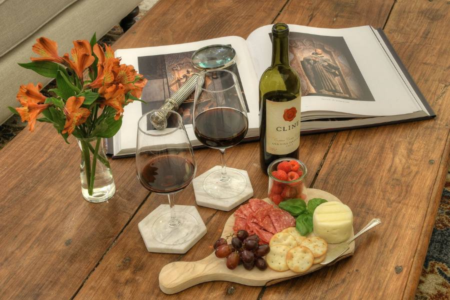 Cheese and wine on a table at Armory Park Inn